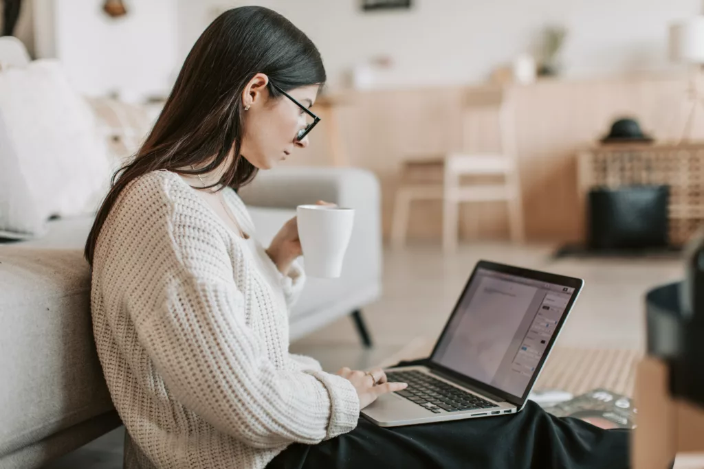 A young woman doing keyword research for her next blog.