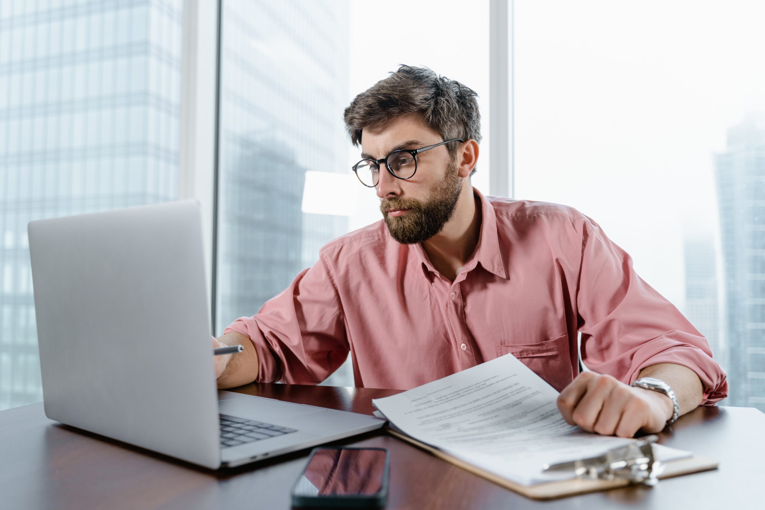 A man working on his marketing tasks and researching.