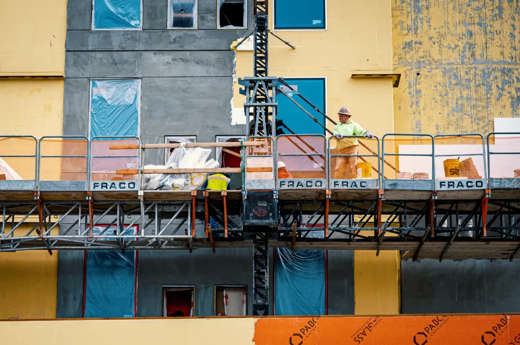 Workers working on a platform.