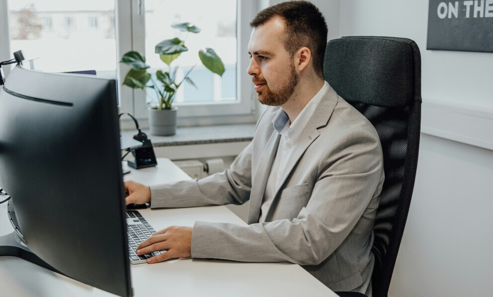 A young man working online with his marketing.